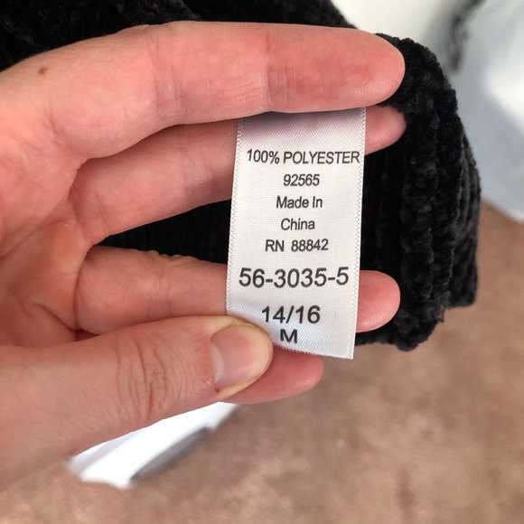 Woman Within Black Sweater - Picture 3 of 4